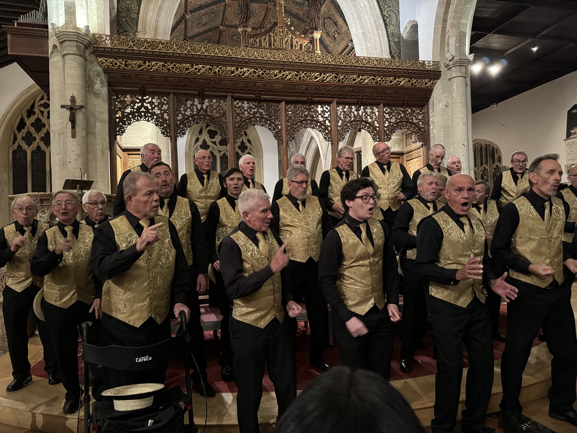 Photograph of male voice choir Thames Valley Chorus performing inside a church in Henley-on-Thames